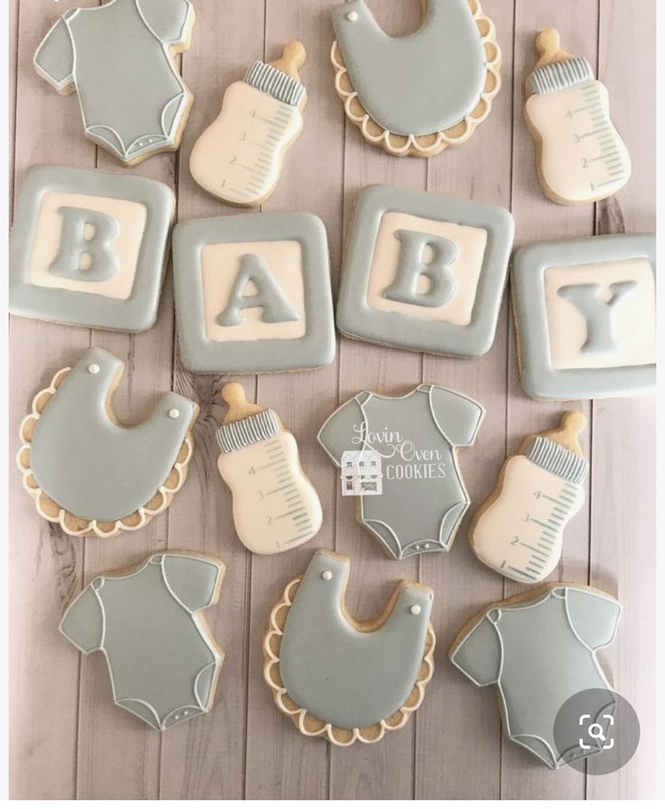 Charming Baby-Themed Cookies Perfect for Showers with Soft Pastels and Adorable Designs.