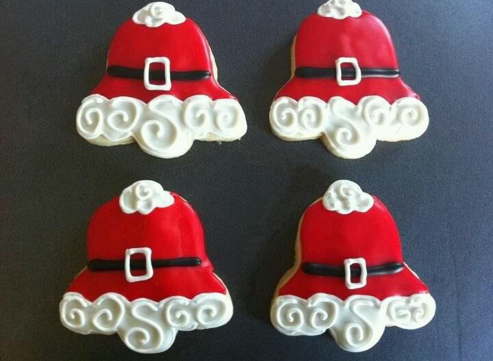 Cheerful Santa Hat Holiday Cookies with Red Icing and Fluffy White Details