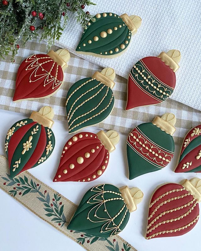 Elegant Holiday Ornaments: Whimsical Red and Green Designs with Gold Accents.