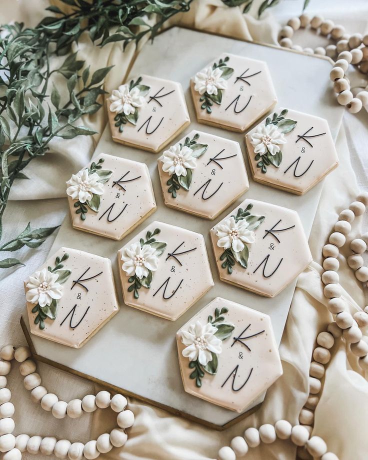 Elegant Floral-Accented Hexagonal Cookies: A Charming Touch for Special Occasions.