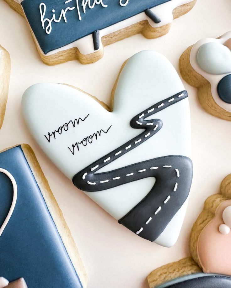 Whimsical Heart-Shaped Cookie Design with Stylized Road Pattern Inspires Creative Nail Art.