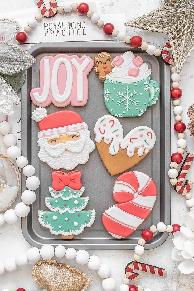 Cheerful Holiday Cookie Designs: Santa, Trees, Candy Canes, and Winter Mugs in Vibrant Colors.