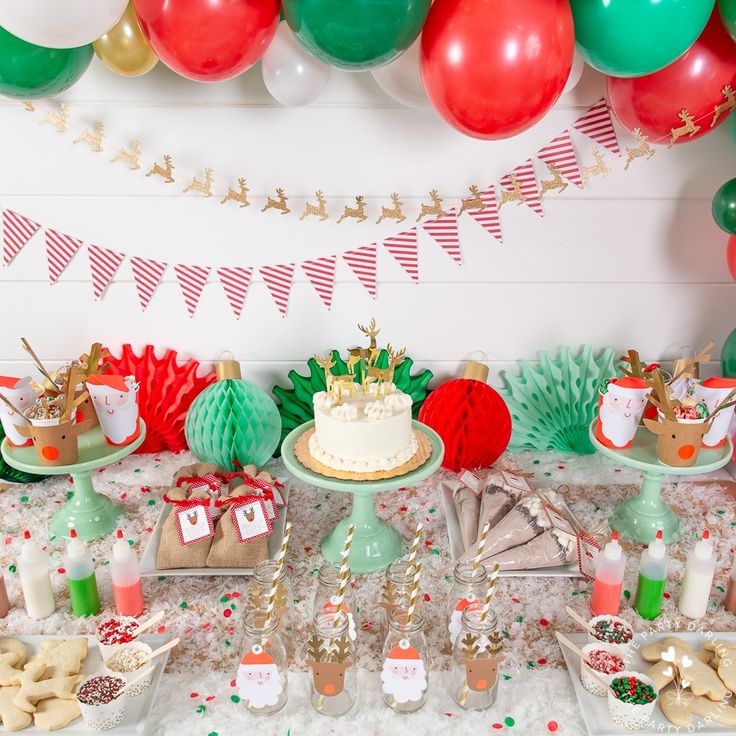 Vibrant Holiday Dessert Table with Whimsical Decorations and Cheerful Treats.