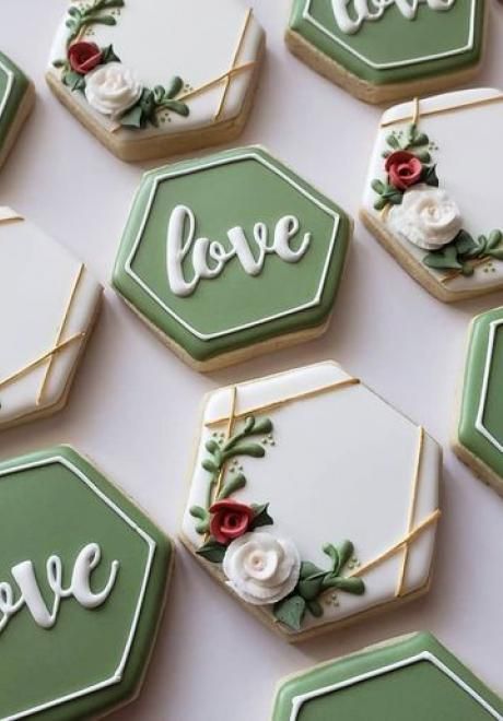 Sophisticated Floral-Embellished Hexagonal Cookies in Soft Green and White.