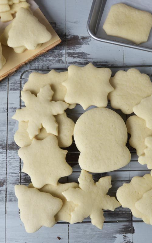 Creative Festive Cookie Shapes Await Decorating on Cooling Rack