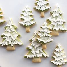 Festive Snowy Effect Christmas Tree Cookies with Vibrant Icing.