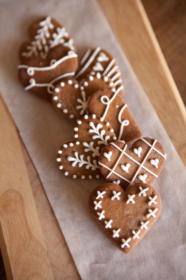 Festive Heart-Shaped Gingerbread Cookies: A Creative Inspiration for Nail Art.