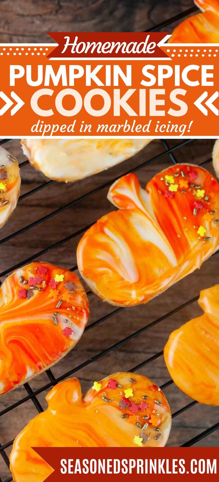 Vibrant Pumpkin Spice Cookies with Marbled Icing and Festive Sprinkles for Fall Celebrations.