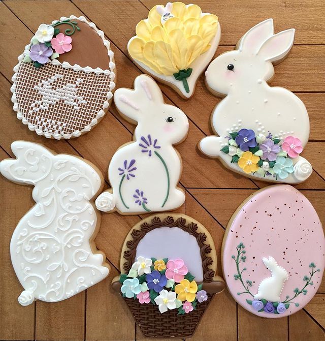 Charming Easter Cookies with Bunny Shapes and Floral Accents in Pastel Colors.