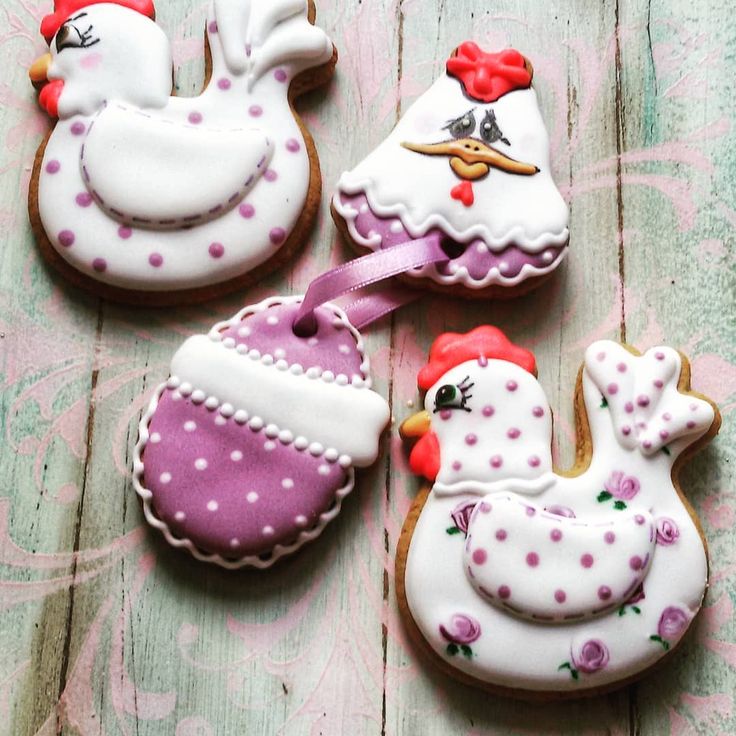 Whimsical Chicken-Shaped Cookies with Floral and Polka Dot Designs for Festive Occasions.