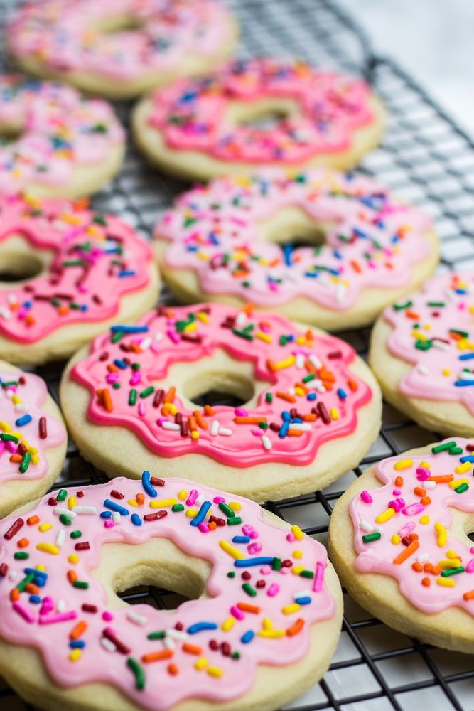 Whimsical Nail Art Inspired by Colorful Frosted Donuts with Vibrant Sprinkles