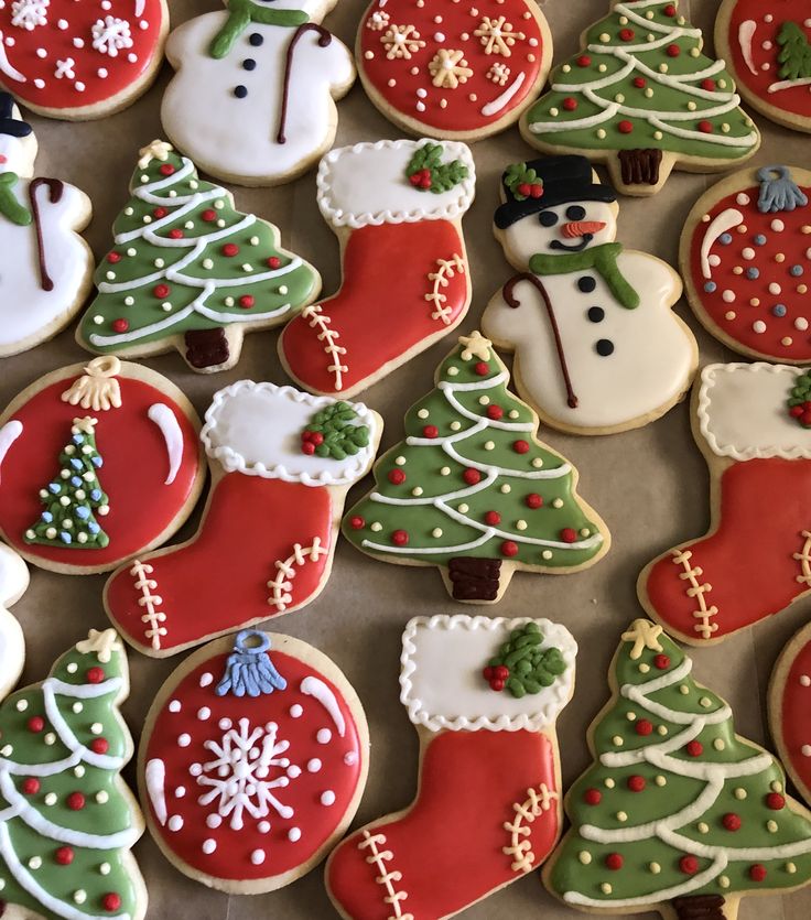 Festive Display of Colorful Holiday-Themed Cookies with Intricate Icing Designs.