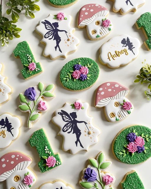 Whimsical Decorative Cookies with Fairy and Floral Designs for Festive Celebrations.