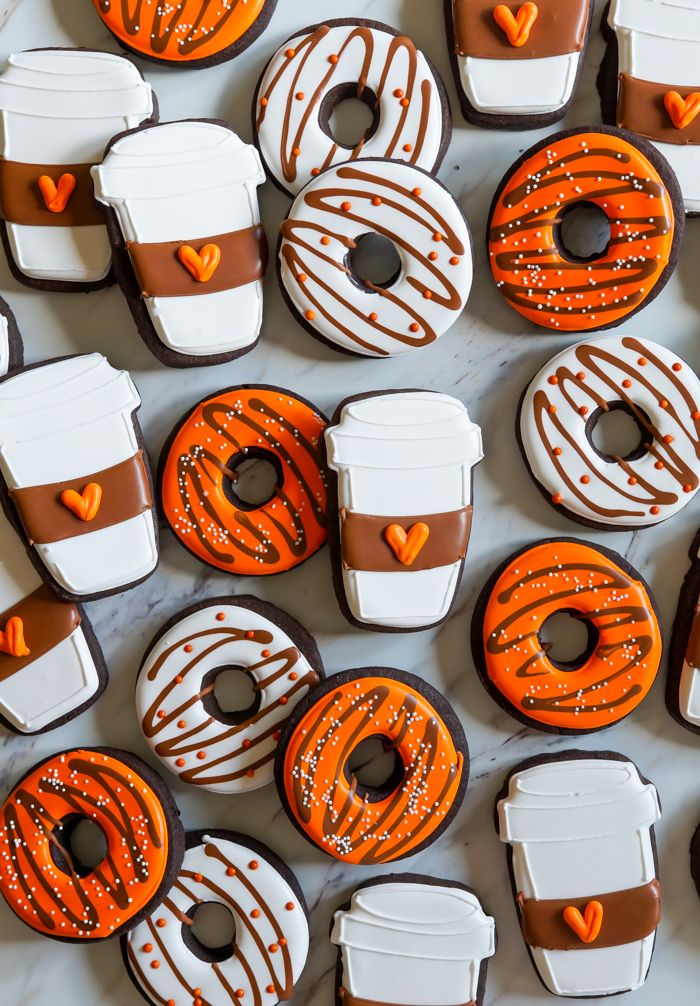 Creative Coffee and Donut-Inspired Cookies Showcase Whimsical Autumnal Designs.