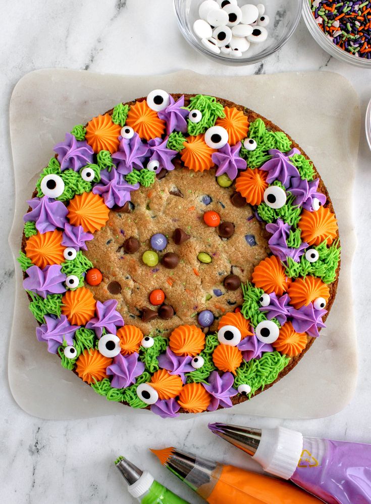 Vibrant Halloween Cookie Cake with Spooky Decorations and Whimsical Candy Accents.