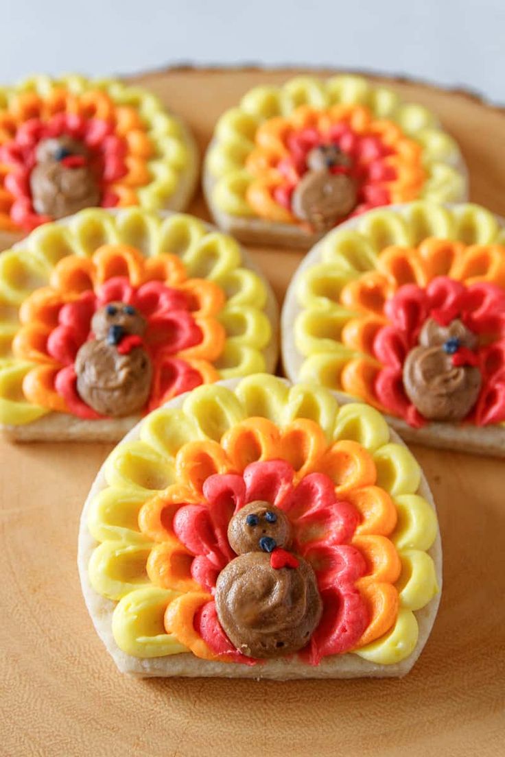 Festive Turkey-Themed Cookies with Vibrant Icing and Whimsical Turkey Figure