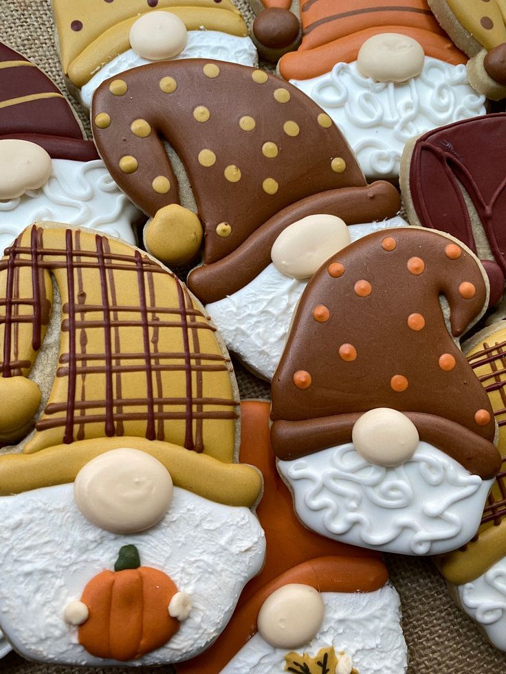 Whimsical Gnome-Shaped Cookies Bring Autumn Cheer with Vibrant Designs and Textures.