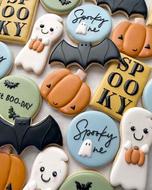 Festive Halloween Cookie Designs with Cute Ghosts, Playful Pumpkins, and Whimsical Bats.