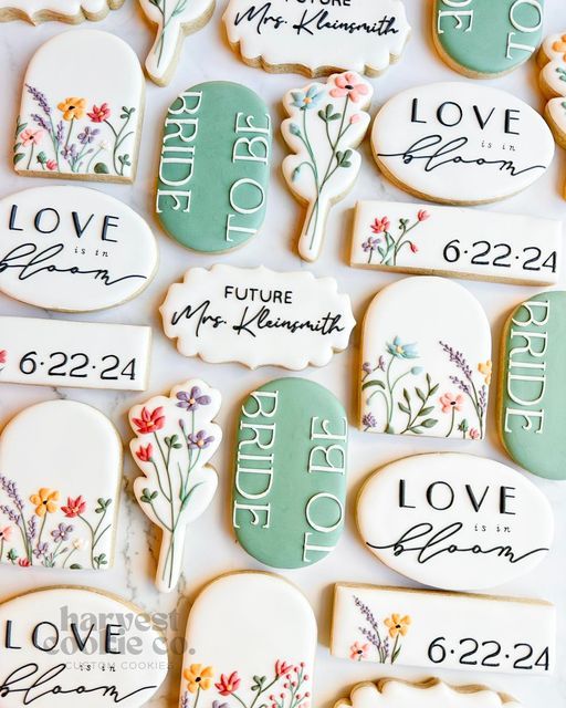 Whimsical Floral Cookie Designs in Pastels: Perfect for Celebratory Bridal Events.