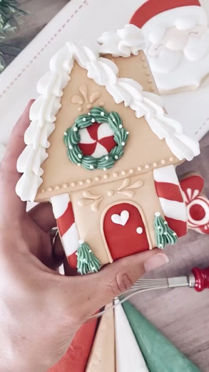 Charming Gingerbread House Design with Festive Icing and Candy Decorations.