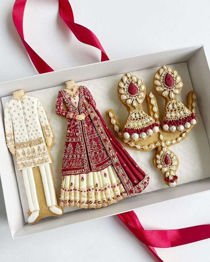 Intricately Designed Decorative Cookies Inspired by Traditional Wedding Attire and Jewelry.