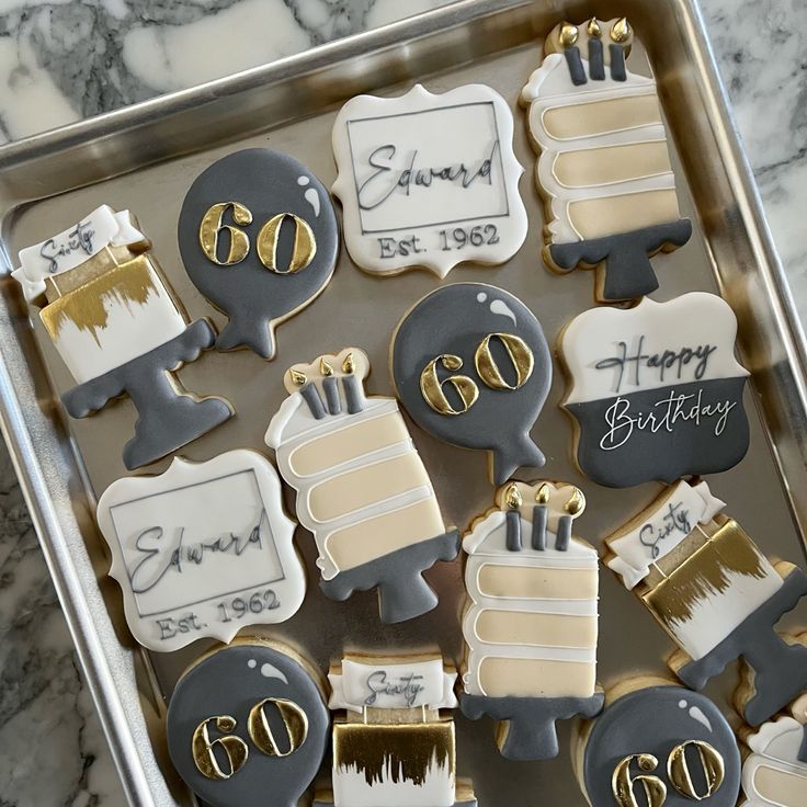 Elegant Birthday-Themed Decorative Cookies on a Marble Tray