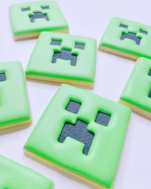 Fun Themed Cookies with Iconic Character Faces and Vibrant Frosting