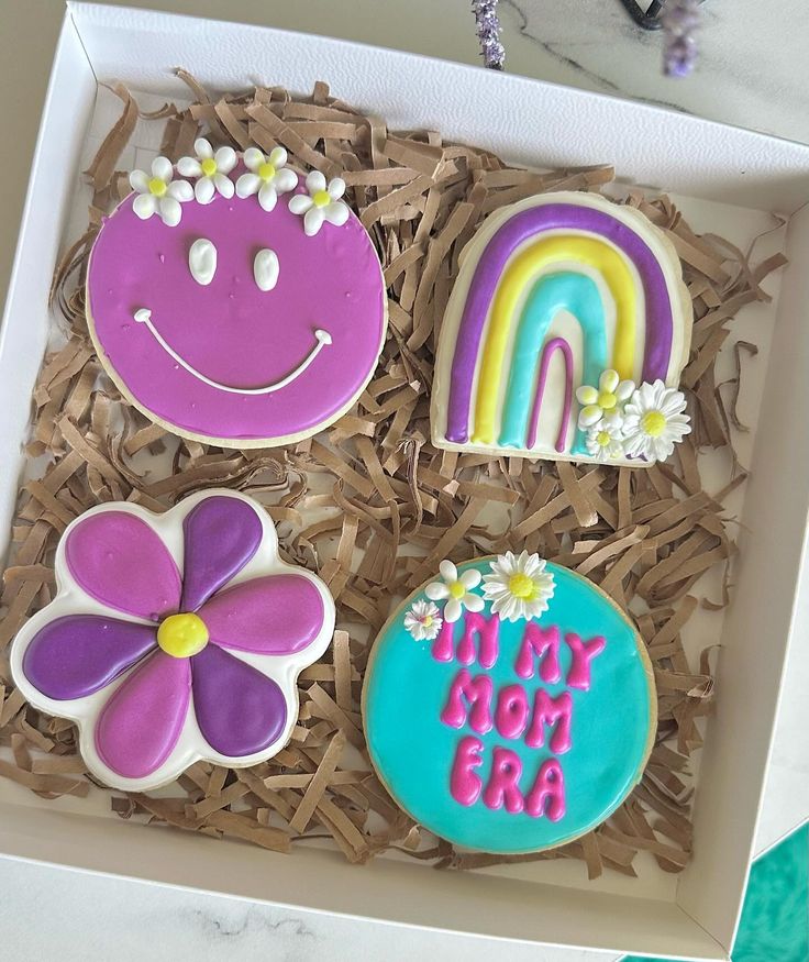 Whimsical Box of Colorful, Playful Cookies for Nail Art Inspiration.