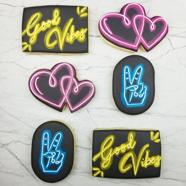 Vibrant Neon Cookie Designs with Playful Shapes and Uplifting Motifs for Celebrations.