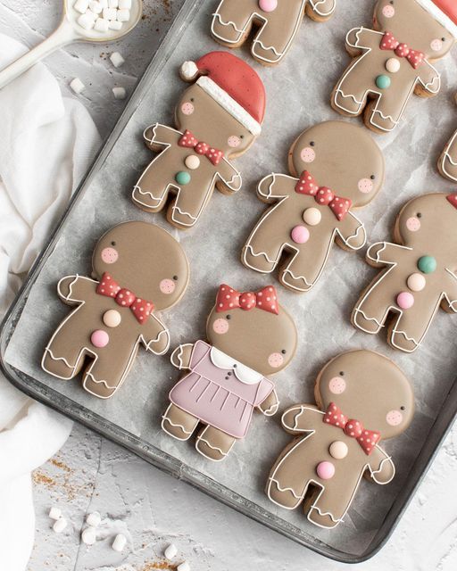 Festively Crafted Gingerbread Cookies on a Decorative Tray Show Whimsical Holiday Charm.