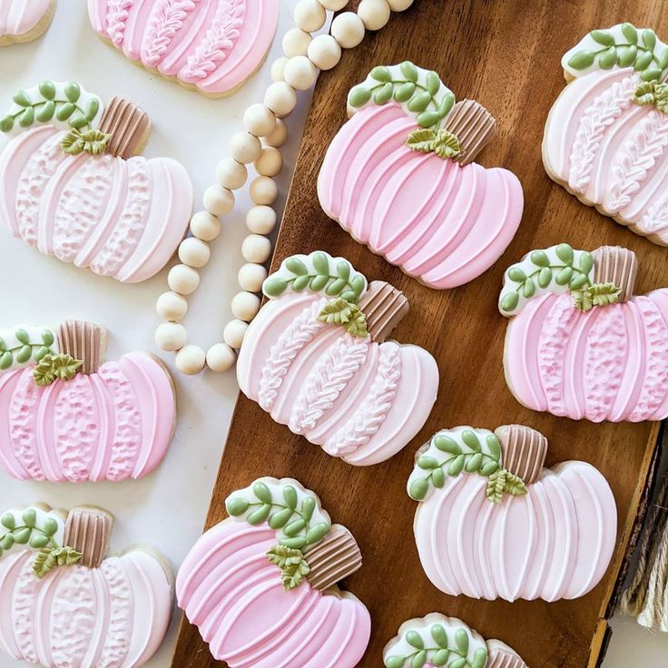 Enchanting Decorative Pumpkin Cookies in Soft Pastel Tones for Cozy Fall Celebrations