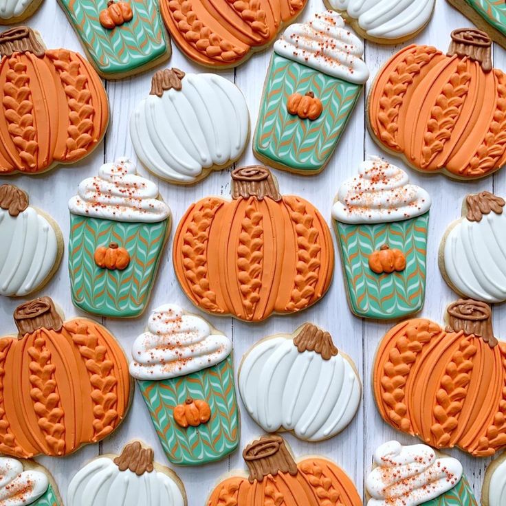 Autumn-Inspired Festive Cookie Designs: Vibrant Pumpkins and Decorative Cupcakes Celebrate Fall