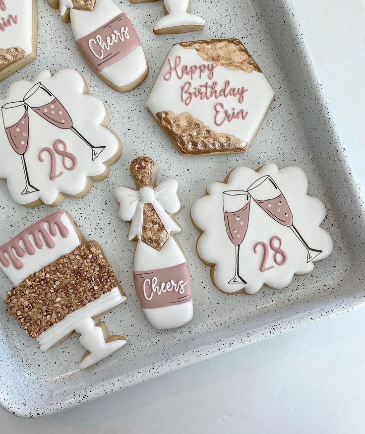 Chic Birthday Cookies: Elegant Designs in Pink and Gold for Celebratory Gatherings.