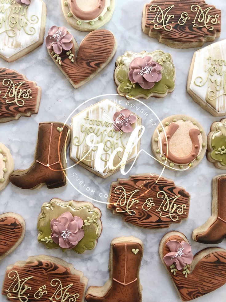 Charming Western-Themed Decorative Cookies in Soft Pastels and Earthy Tones for Special Celebrations.