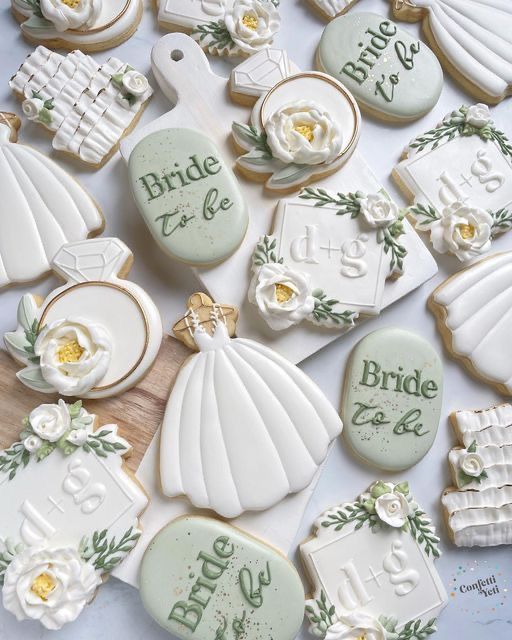 Whimsical Wedding-Themed Cookies: Elegant Designs for Celebratory Occasions.