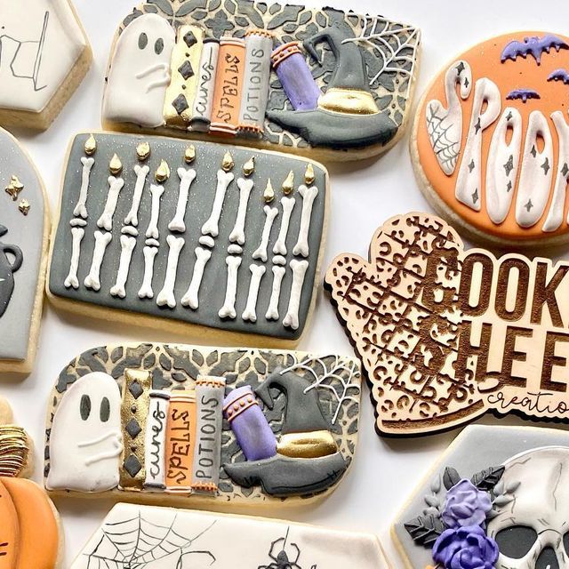 Intricate Halloween Cookie Designs: Whimsical Decorations and Festive Autumn Colors.