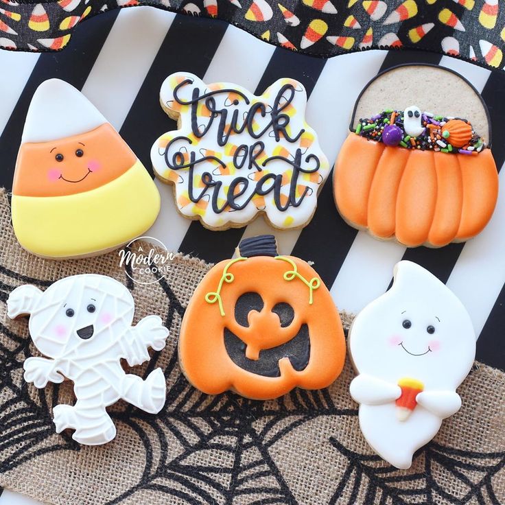 Whimsical Halloween Cookies: Cheerful Ghosts, Pumpkins, and Candy Corn Designs.