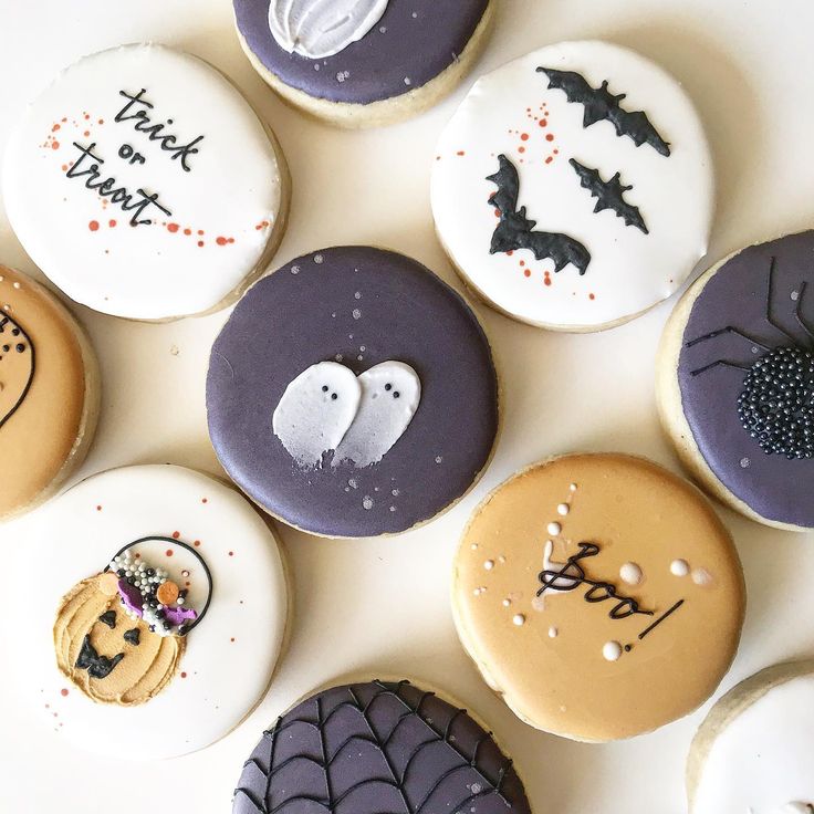 Festive Halloween Cookies with Creative Designs and Seasonal Colors.