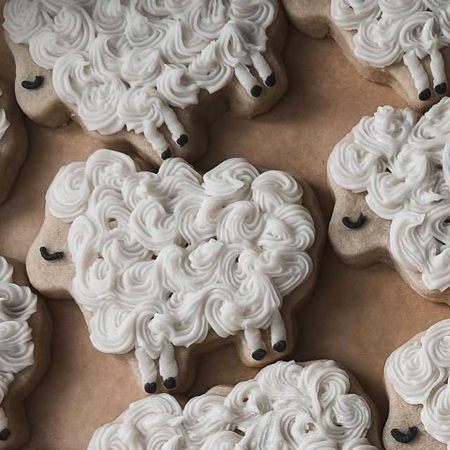 Charming Fluffy Sheep-Shaped Cookies with Woolly Icing for Themed Parties.