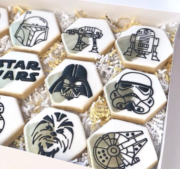 Colorful Hexagon-Shaped Cookies Featuring Iconic Sci-Fi Characters: A Perfect Treat for Themed Celebrations.