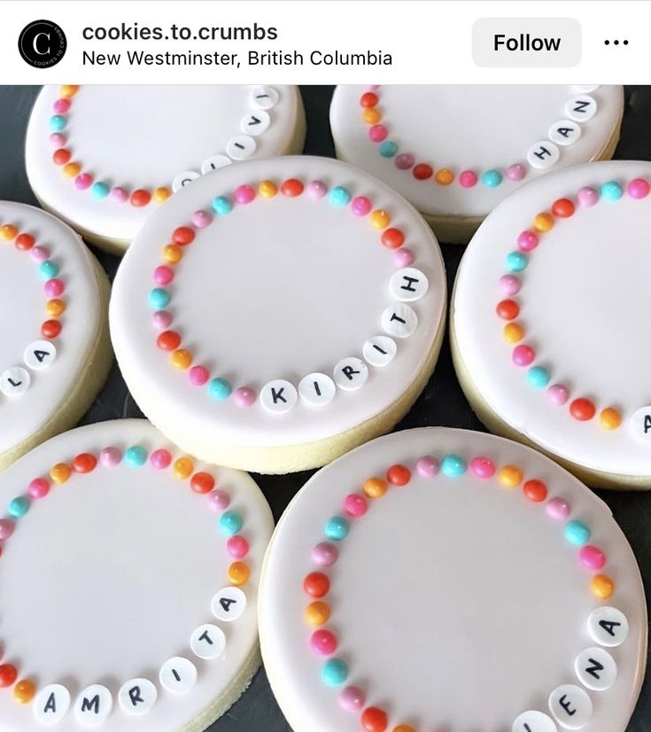 Cheerful, Personalized Circular Cookies with Vibrant Icing Designs for Celebrations.