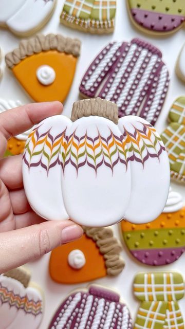 Charming Pumpkin-Shaped Decorative Cookie with Intricate Autumn Icing Designs