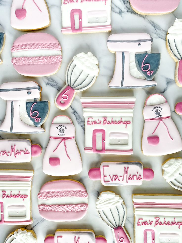 Charming Baking-Themed Decorative Cookies in Pastel Palette Perfect for Celebrations.