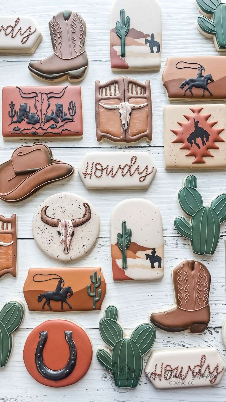 Rustic Western-Themed Decorative Cookies with Intricate Designs and Earthy Color Palette.