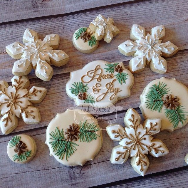 Festive Decorative Cookies: Intricate Winter Wonderland Designs with Icing and Accents.