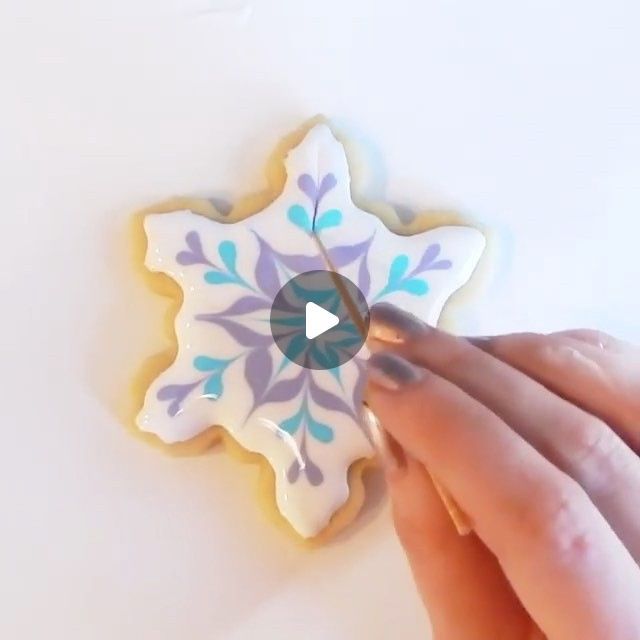 Whimsical Winter-Inspired Snowflake Nail Art Design in Soft Pastels