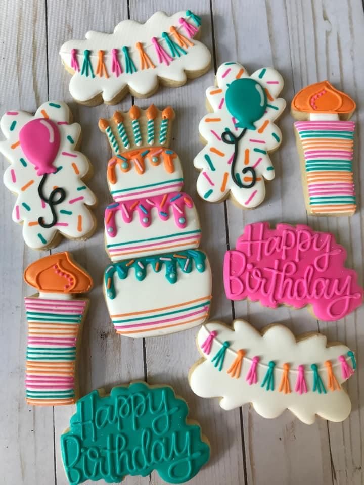 Artfully Decorated Colorful Birthday Cookies with Playful Designs.