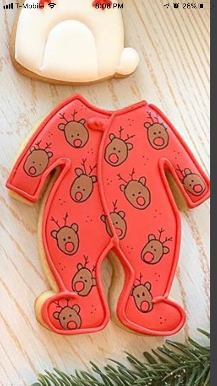 Whimsical Reindeer Onesie Cookie Design for Festive Holiday Celebrations