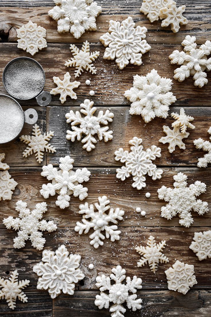 Elegant Snowflake Nail Art: Whimsical Winter Aesthetic for Festive Occasions.