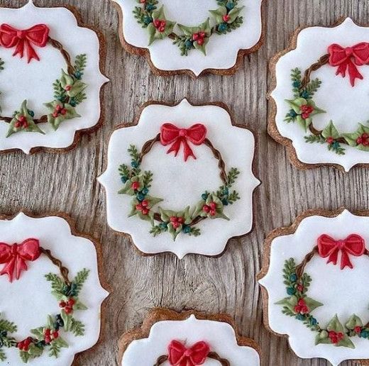 Intricate Festive Cookie Designs with Wreath Patterns and Vibrant Holiday Accents